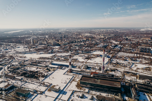 factories and pipes of a big city in winter
