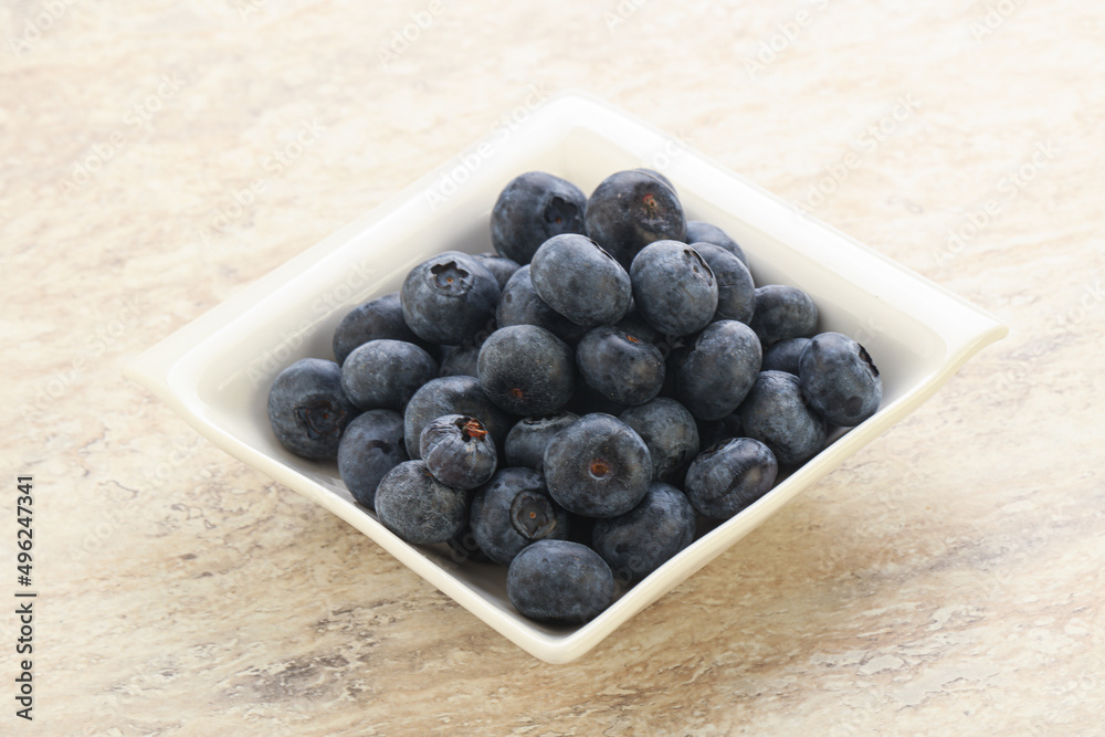 Sweet ripe blueberry heap in the bowl Sweet ripe blueberry heap in the bowl