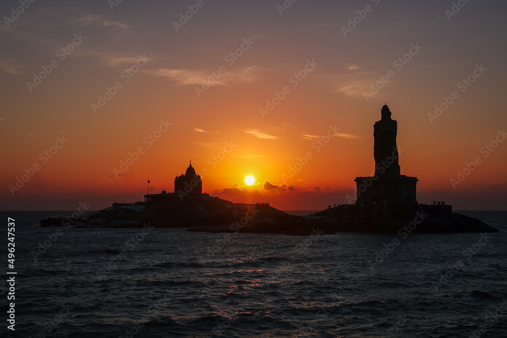 Sunset view point Vivekananda rock memorial AND Thiruvalluvar statue near sea at Kanyakumari Tamilnadu South India
