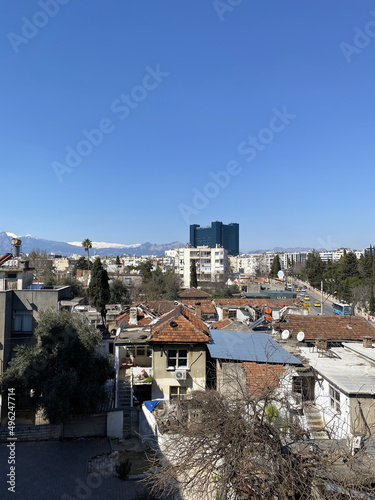 historical buildings in Antalya province Turkey. Modern electircal tram driving in turkish Antalya city.