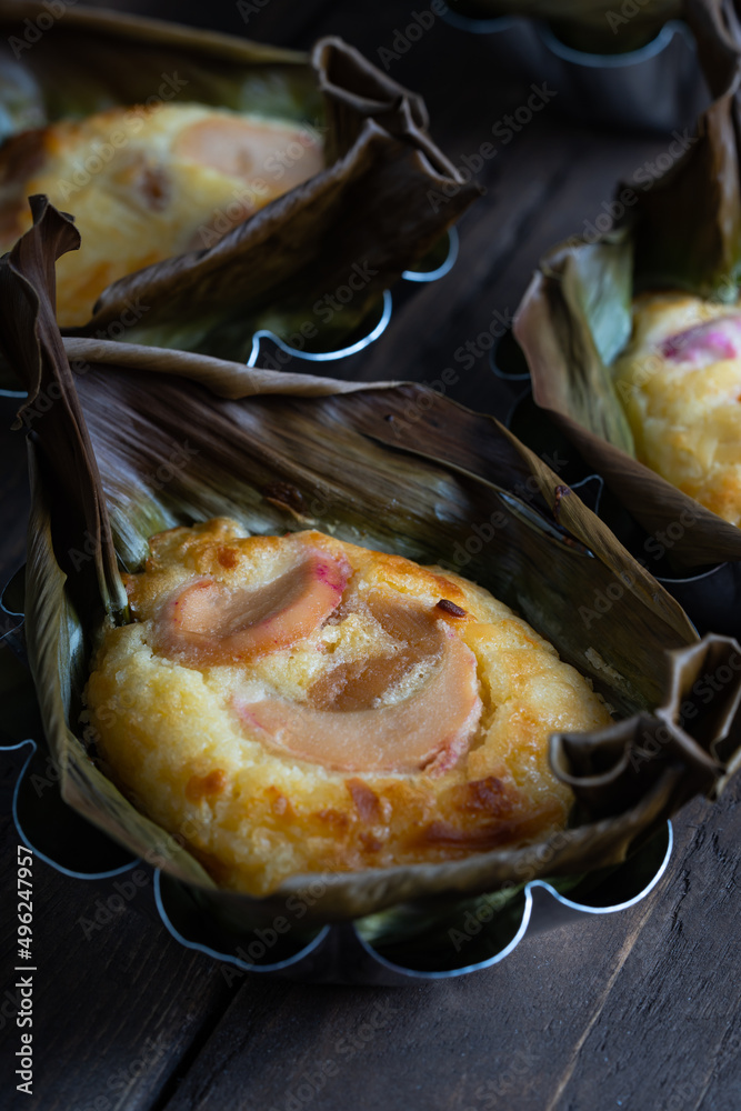 delicious homemade bibingka; Filipino Coconut rice cake with salted egg