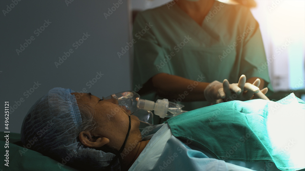 A surgeon diagnosing a senior woman's heart problem before performing a surgical procedure. Concept hospital care A surgeon diagnosing a senior woman's heart problem before performing a surgical procedure. Concept hospital care