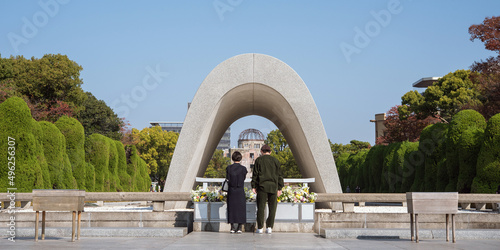 Memorial Cenotaph in Hiroshima Peace Memorial Park and tourists　原爆死没者慰霊碑と観光客 広島平和記念公園 photo