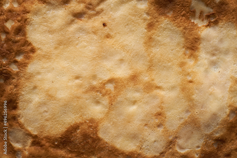 Background from the finished pancake close-up. Fried pancakes. Pancake week
