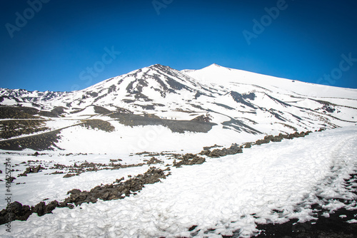 snow on etna, vulcano, sicily, italy, europe, lava stone, black, crateri silvestri photo