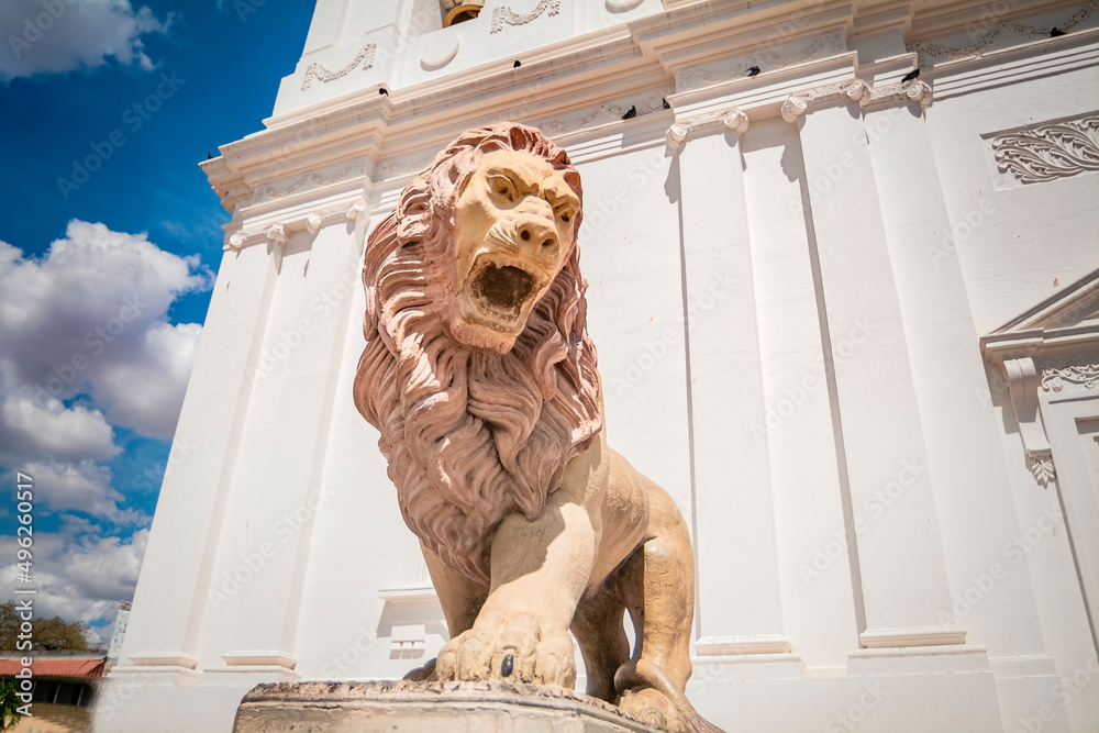 Monument of a lion, Lion statue near a church, lion statue in the city