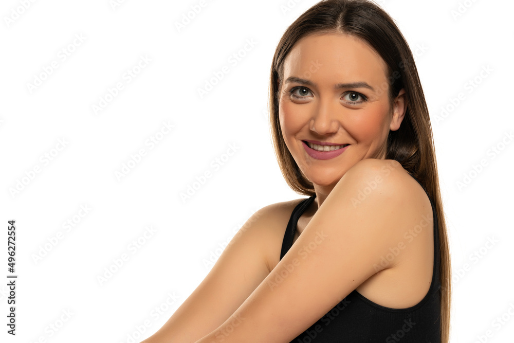 portrait of a young beautiful smiling woman with blue eyes and makeup on a white background portrait of a young beautiful smiling woman with blue eyes and makeup on a white background