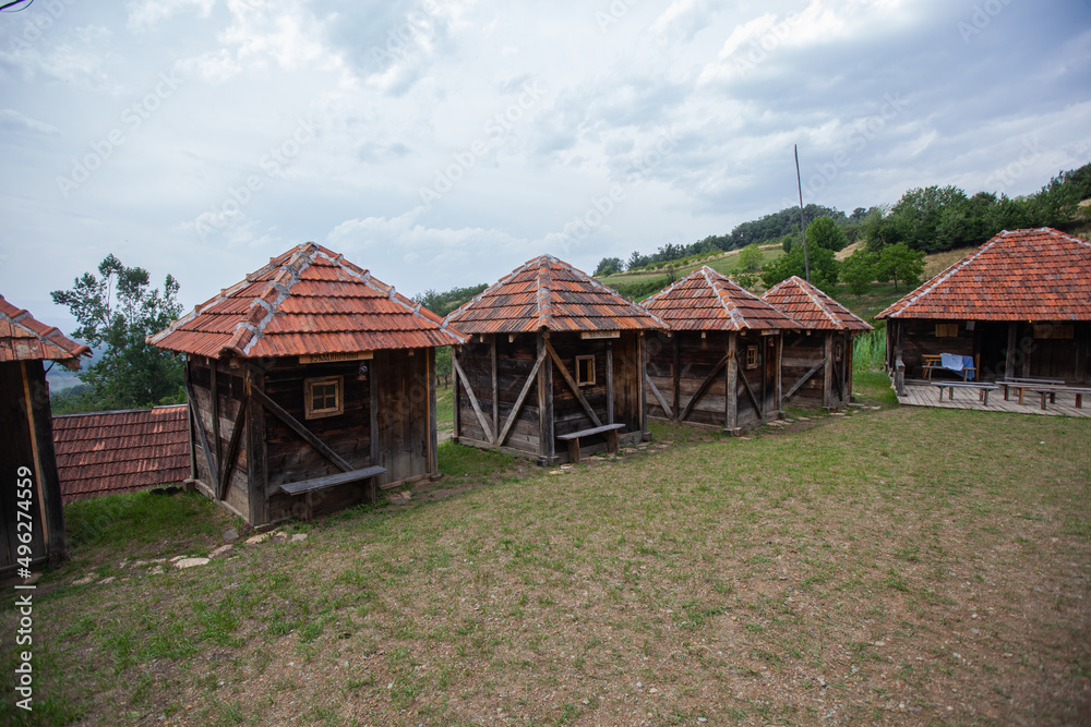 Old rural traditional wooden small log cabin. Village at Serbia. Countryside landscape. Mountain Kopaonik. Old rural traditional wooden small log cabin. Village at Serbia. Countryside landscape. Mountain Kopaonik.