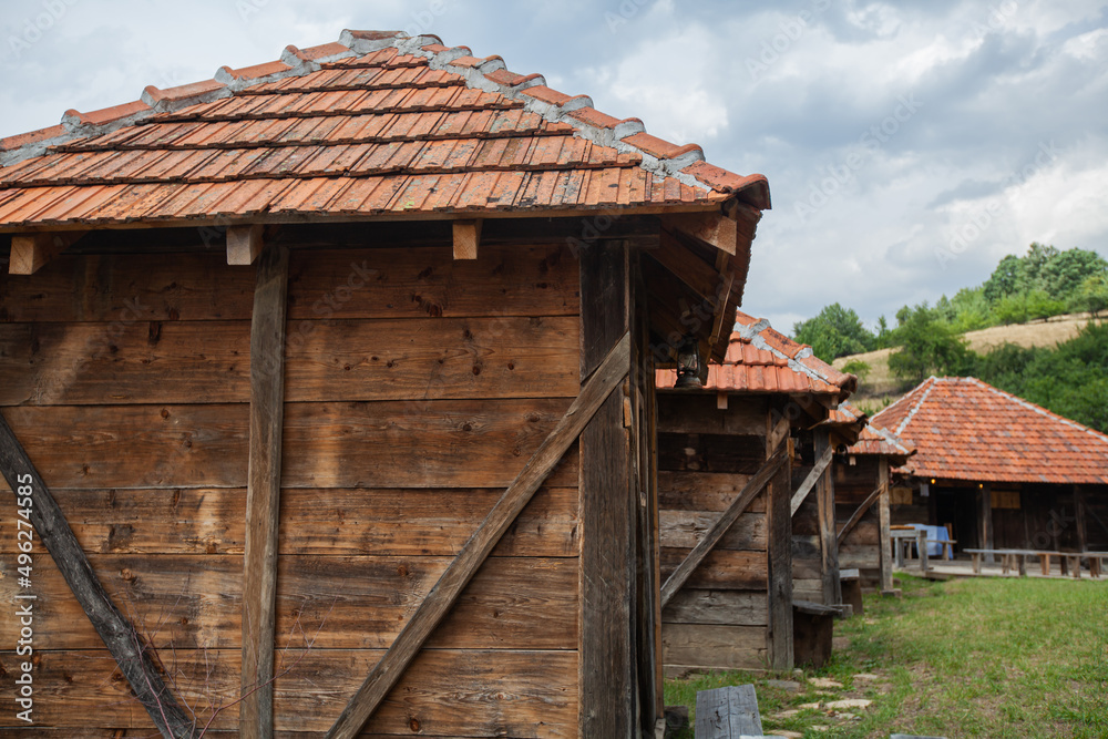 Old rural traditional wooden small log cabin. Village at Serbia. Countryside landscape. Mountain Kopaonik. Old rural traditional wooden small log cabin. Village at Serbia. Countryside landscape. Mountain Kopaonik.