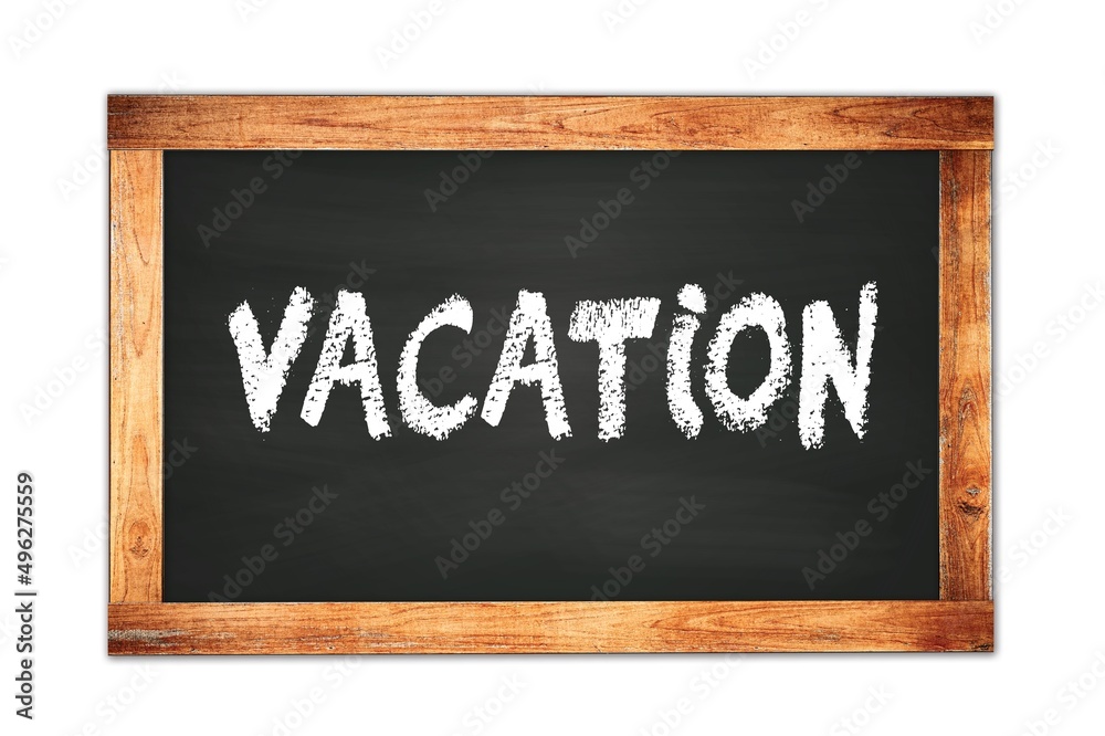 Fototapeta premium VACATION text written on wooden frame school blackboard.