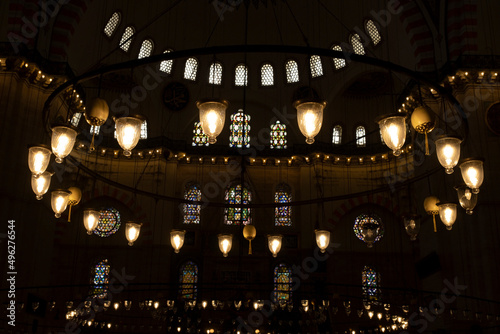 Suleymaniye Mosque chandeliers and windows. Selective Focus On Chandeliers.