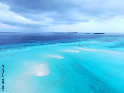 Amazing azure blue Maldive islands reef seascape © Kisika