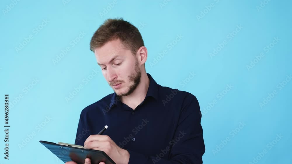Taking notes. Project management. Business planning. Boomerang motion. Busy man inspector writing checklist on clipboard isolated on blue background GIF loop animation. Taking notes. Project management. Business planning. Boomerang motion. Busy man inspector writing checklist on clipboard isolated on blue background GIF loop animation.