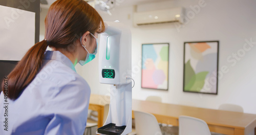 Wallpaper Mural woman use thermometer equipment Torontodigital.ca