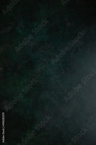 Dark green natural paint cement stone background or texture. Trend mood view. Copyspace
