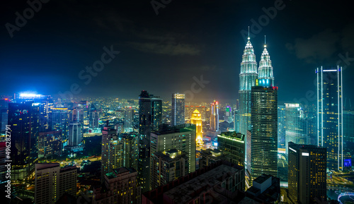 Panorama aerial night view of Kuala Lumpur city skyline. Malaysia. Cool mode.