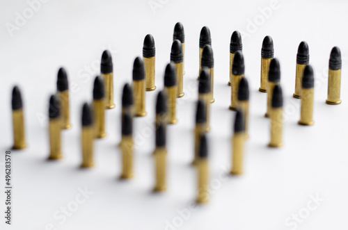 set of blurred military bullets on white.
