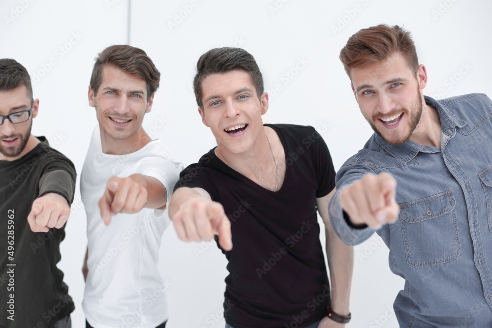Happy young group of people pointing at you. Happy young group of people pointing at you.