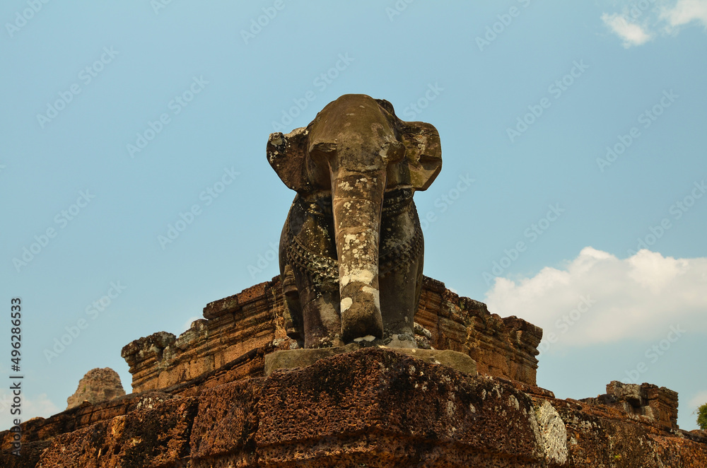 Cambodia, Angkor Temple complex, Beautiful view of ancient ruins of East Mebon temple, temple-mountain, sculpture of elephant