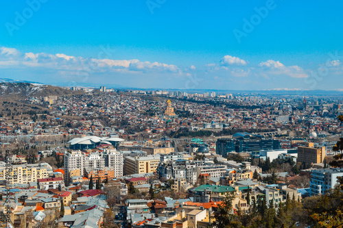 Fototapeta Naklejka Na Ścianę i Meble -  Panoramic view of the snow-covered city of Tbilisi spring
