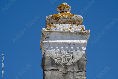 Close view of a traditional algarvian chimney on the roof of a house in the old town of Tavira, Algarve, Portugal