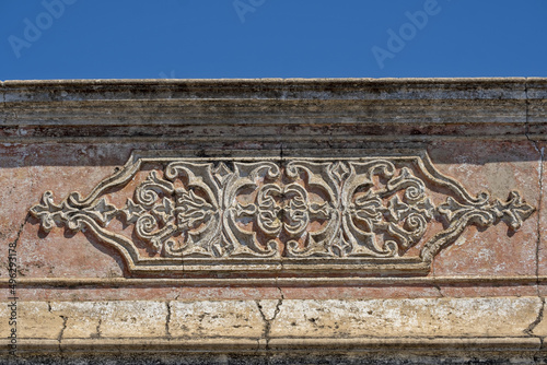 old traditional pediment from the Algarve in Tavira, Portugal

