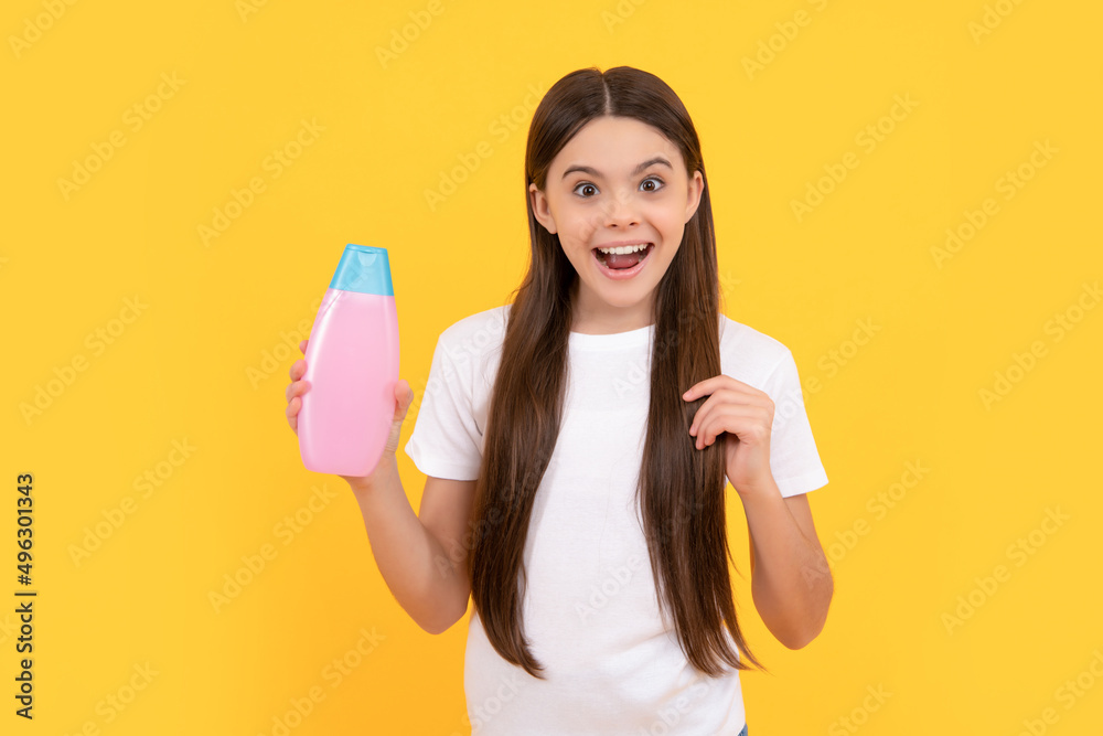 kid use shower gel. shampooing long hair in salon. child with conditioner. daily habits kid use shower gel. shampooing long hair in salon. child with conditioner. daily habits