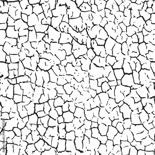 A seamless pattern of dry cracked texture of soil or old paint.