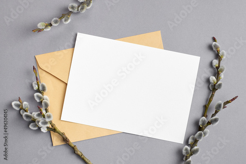 Greeting or invitation card mockup with envelope and willow twigs