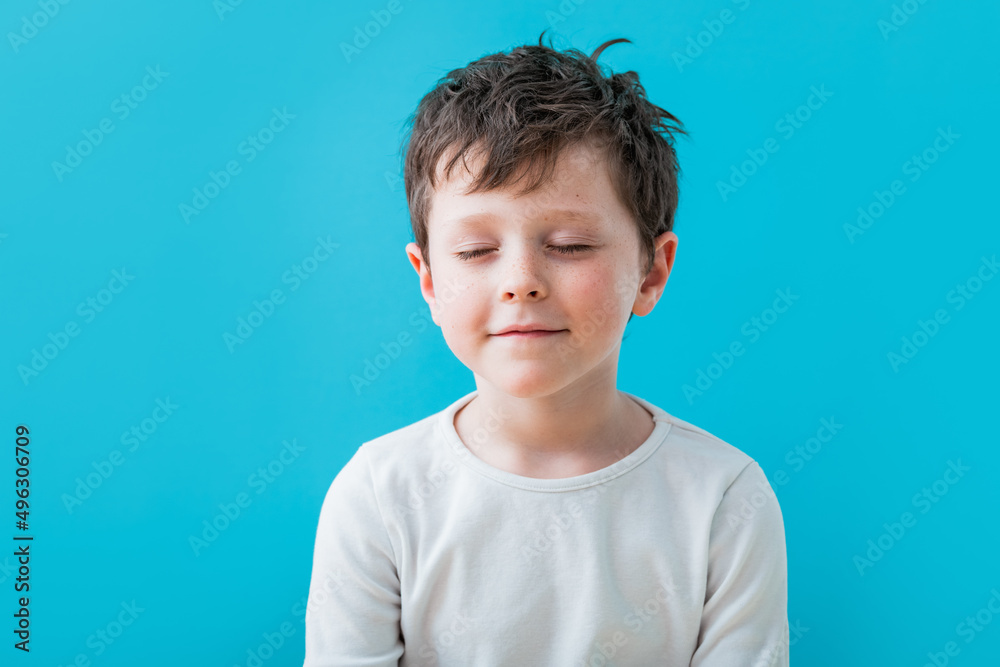 Positive boy with eyes closed and smile Positive boy with eyes closed and smile