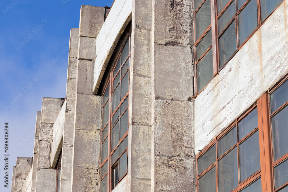 Texture of an old dirty factory windows with a lantern, industrial factory Texture of an old dirty factory windows with a lantern, industrial factory