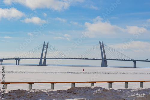 Modern bridge over the river in the urban city in winter 