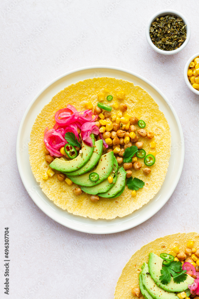 Fresh tortillas with various toppings Fresh tortillas with various toppings