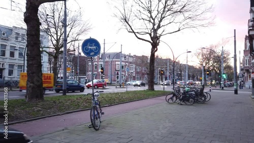 Rotterdam, Netherlands, January 28, 2022: DOLLY SHOT - Street view and generic architecture from downtown Rotterdam. Rotterdam is the second largest city of the Netherlands. photo