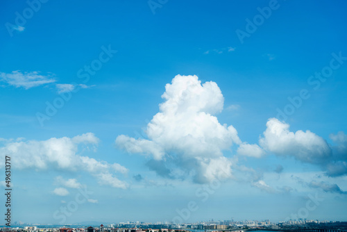 The city under cloud blue sky