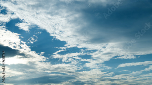 Blue sky covering with white cumulus © xy
