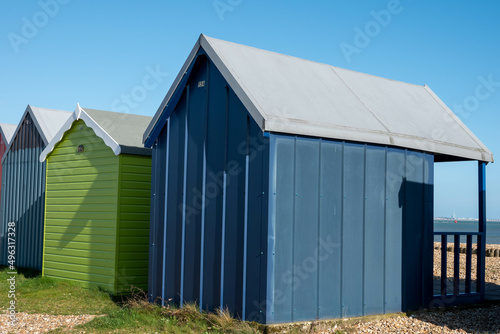 coloured beachhuts on the beach at Calshot Hampshire England © Penny