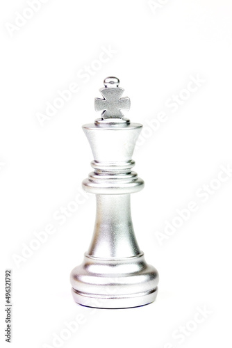 Silver king chess figure isolated on white background. Chess is a game of war to fight with strategy between two players.