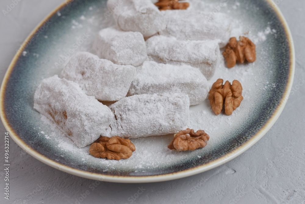 Fototapeta premium Traditional Turkish delight lokum with walnut.