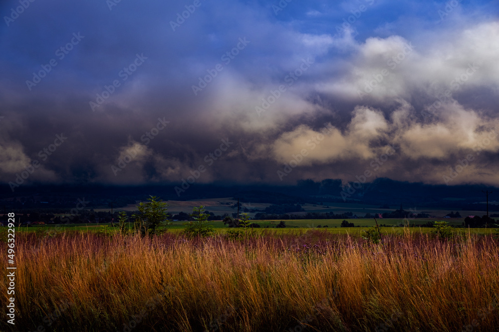 Landscape with cloudly sky after storm - Sudetes in western Poland Landscape with cloudly sky after storm - Sudetes in western Poland