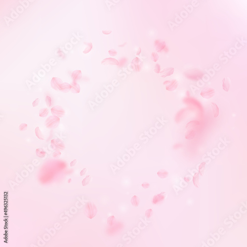 Sakura petals falling down. Romantic pink flowers vignette. Flying petals on pink square background. Love, romance concept. Fancy wedding invitation.
