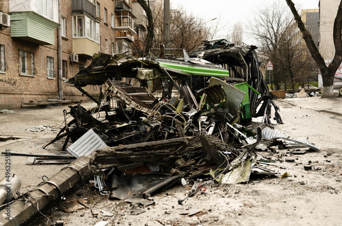 The trolleybus was destroyed on the street after Russian shelling. consequences of the war in Ukraine. broken transport.