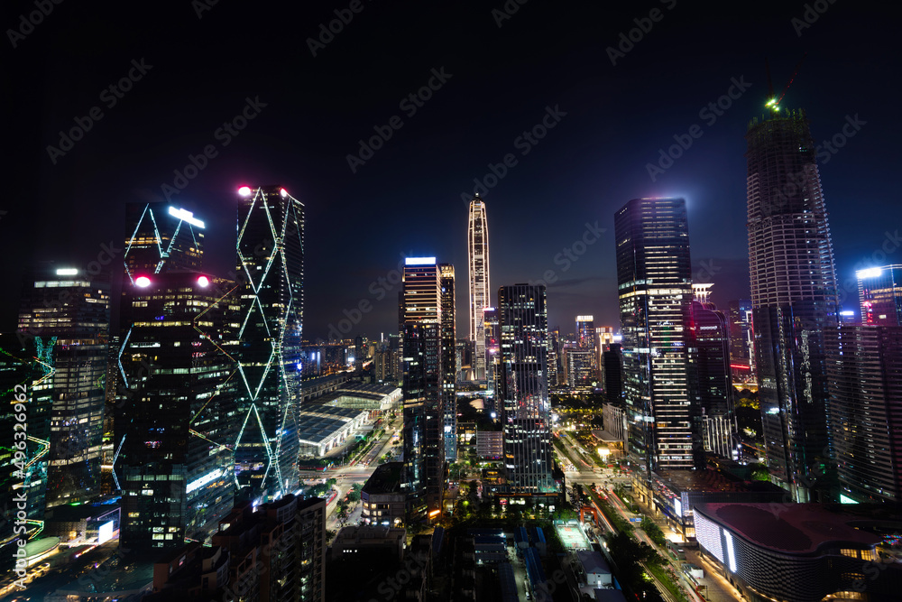Fototapeta premium Modern office buildings in the city at night