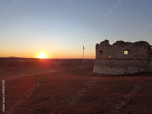 Beautiful sunset over the castle on the hill