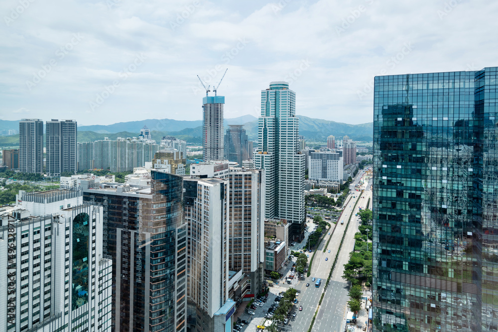 Obraz premium Skyscrapers and unfinished building in the city
