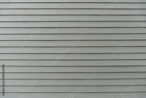 Wall of gray chera slats line up beautifully. for backgroun and textured.
