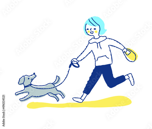 散歩中に一緒に走る犬と若い女性