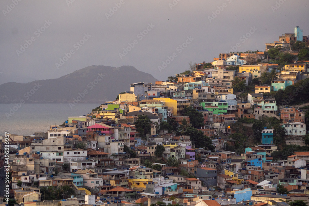 Obraz premium community of Arraial do Cabo, Rio de Janeiro, Small houses on the hill.
