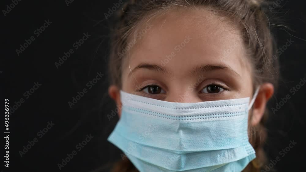 Girl in protective mask. Child face in safety mask. Prevention of diseases by virus. Portrait of girl in protective mask. Schoolgirl in medical mask. Close-up of child face. Fighting virus at school Girl in protective mask. Child face in safety mask. Prevention of diseases by virus. Portrait of girl in protective mask. Schoolgirl in medical mask. Close-up of child face. Fighting virus at school