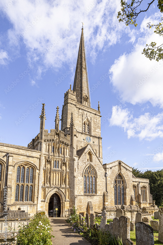 The parish church of St John the Baptist in the Cotswold town of Burford, Oxfordshire, England UK